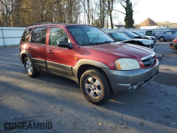 2001 Mazda Tribute LX with VIN 4F2CU08111KM19933, listed as a Copart auction lot 81174614 with 209,736 mi miles and Salvage Title. Bid and sale history available at DreamBid. Image 4.