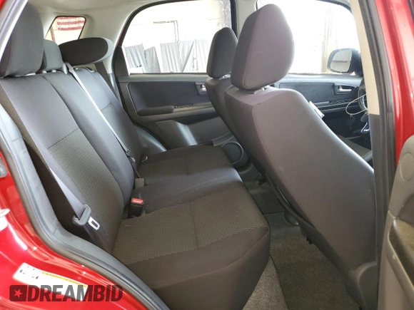 2013 Suzuki SX4 Crossover z VIN JS2YB5A38D6100035, wystawiony jako Copart lot #59970015 z przebiegiem 119 995 mil mil oraz Szkoda całkowita • Salvage title. Historia ofert i sprzedaży dostępna na DreamBid. Obrazek 10.