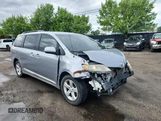 2012 Toyota Sienna LE AAS with VIN 5TDKK3DC4CS244048, listed as a Copart auction lot 55940585 with 163,222 mi miles and Clean Title. Bid and sale history available at DreamBid. Image 1.