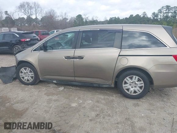 2012 Honda Odyssey LX z VIN 5FNRL5H25CB019912, wystawiony jako IAAI lot #41458224 z przebiegiem 158 980 mil mil oraz . Historia ofert i sprzedaży dostępna na DreamBid. Obrazek 15.
