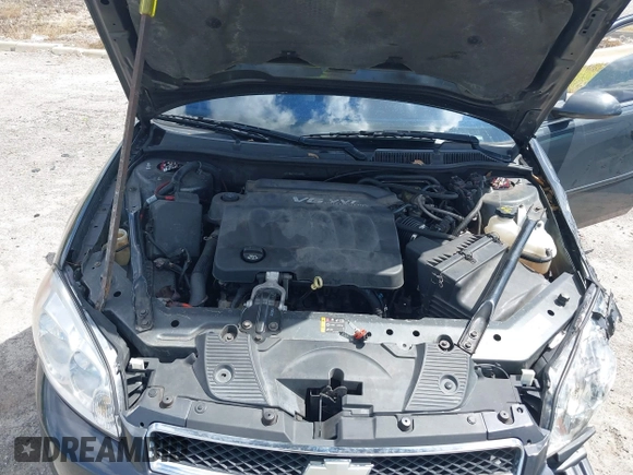 2014 Chevrolet Impala LT with VIN 2G1WB5E31E1146318, listed as a IAAI auction lot 40413281 with 422,345 mi miles and . Bid and sale history available at DreamBid. Image 10.
