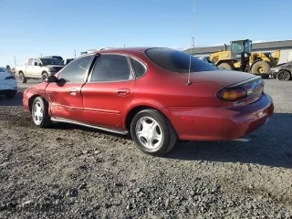 1997 Ford Taurus GL with VIN 1FALP52U6VA301952, listed as a Copart auction lot 74245204 with 152,562 mi miles and Salvage Title. Bid and sale history available at carsss.com. Image 2.