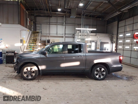 2019 Honda Ridgeline RTL with VIN 5FPYK2F54KB005791, listed as a IAAI auction lot 41285980 with 49,729 mi miles and . Bid and sale history available at DreamBid. Image 15.