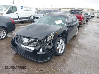 2005 Nissan Maxima 3.5 SL with VIN 1N4BA41E15C845314, listed as a IAAI auction lot 41894273 with 308,057 mi miles. Bid and sale history available at carsss.com. Image 2.