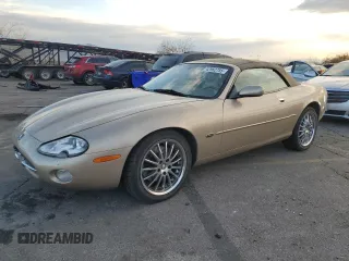 2002 Jaguar XK with VIN SAJDA42C12NA24962, listed as a Copart auction lot 42982755 with 125,097 mi miles and Salvage Title. Bid and sale history available at DreamBid. Image 1.