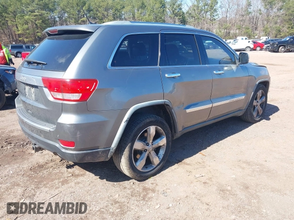 2012 Jeep Grand Cherokee Overland with VIN 1C4RJECT7CC105614, listed as a IAAI auction lot 41629174 with 264,756 mi miles. Bid and sale history available at carsss.com. Image 4.