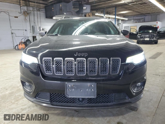 2021 Jeep Cherokee 80th Anniversary with VIN 1C4PJMMN2MD128053, listed as a Copart auction lot 54262175 with 47,454 mi miles and Salvage title. Bid and sale history available at DreamBid. Image 5.