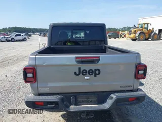 2020 Jeep Gladiator Sport S with VIN 1C6HJTAG7LL128940, listed as a IAAI auction lot 42108154 with 90,596 mi miles and . Bid and sale history available at DreamBid. Image 16.