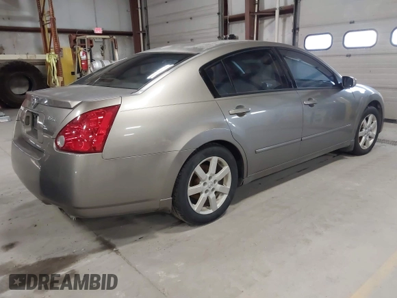 2004 Nissan Maxima SE with VIN 1N4BA41E64C911306, listed as a IAAI auction lot 41901758 with 160,841 mi miles and . Bid and sale history available at DreamBid. Image 4.