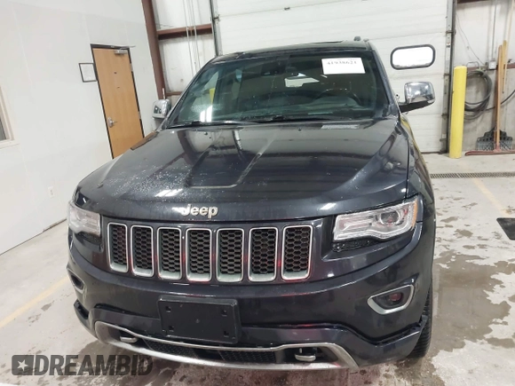 2014 Jeep Grand Cherokee Overland with VIN 1C4RJFCT9EC234270, listed as a IAAI auction lot 41938621 with 144,541 mi miles and . Bid and sale history available at DreamBid. Image 12.