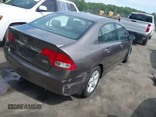 2010 Honda Civic LX-S z VIN 2HGFA1F60AH544781, wystawiony jako IAAI lot #42303801 z przebiegiem 168 544 mil mil oraz . Historia ofert i sprzedaży dostępna na DreamBid. Obrazek 4.
