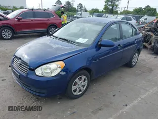 2009 Hyundai Accent Auto GLS with VIN KMHCN46C69U313921, listed as a IAAI auction lot 42011166 with 123,026 mi miles. Bid and sale history available at carsss.com. Image 2.