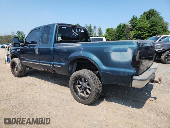 1999 Ford F-250 XL with VIN 1FTNX21FXXEC41173, listed as a Copart auction lot 65117905 with 303,358 mi miles and Clean title. Bid and sale history available at DreamBid. Image 2.