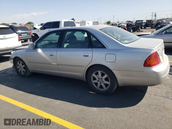 2000 Toyota Avalon XL with VIN 4T1BF28B7YU112576, listed as a Copart auction lot 59726505 with 242,412 mi miles and Salvage title. Bid and sale history available at DreamBid. Image 2.