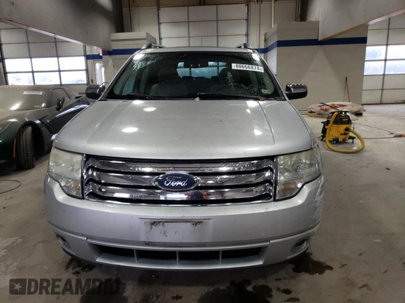 2009 Ford Taurus X Limited with VIN 1FMDK03W59GA01446, listed as a Copart auction lot 80666874 with 135,957 mi miles and Salvage title. Bid and sale history available at DreamBid. Image 5.