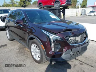 2021 Cadillac XT4 FWD Luxury with VIN 1GYAZAR43MF043816, listed as a IAAI auction lot 41593795 with 36,102 mi miles and . Bid and sale history available at DreamBid. Image 1.