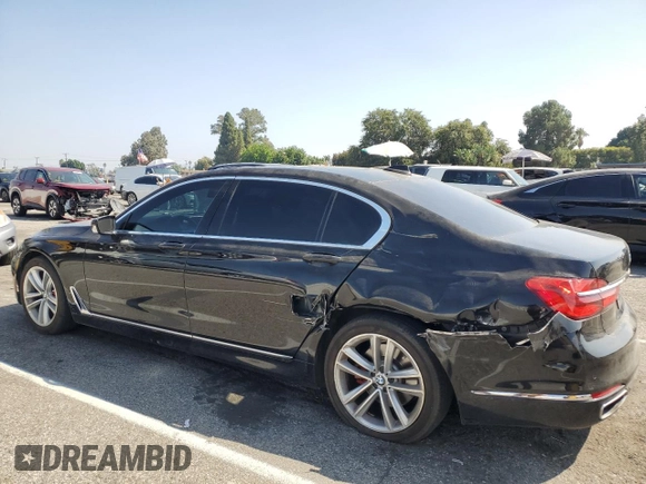 2016 BMW 7 Series 740i with VIN WBA7E2C59GG547804, listed as a Copart auction lot 68620463 with 122,937 mi miles. Bid and sale history available at carsss.com. Image 2.
