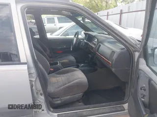 1998 Jeep Grand Cherokee Laredo with VIN 1J4GZ58S6WC319265, listed as a IAAI auction lot 42619853 with 238,667 mi miles and . Bid and sale history available at DreamBid. Image 5.