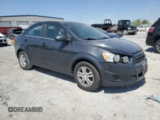 2015 Chevrolet Sonic LT with VIN 1G1JC5SH6F4134436, listed as a Copart auction lot 52627365 with 153,286 mi miles and Salvage Title. Bid and sale history available at DreamBid. Image 4.