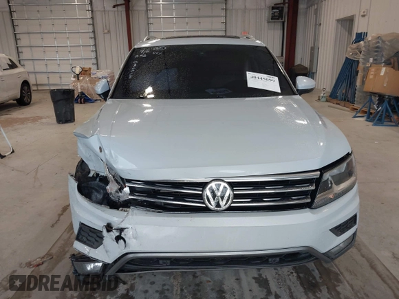 2019 Volkswagen Tiguan SE with VIN 3VV3B7AX9KM030028, listed as a IAAI auction lot 40445099 with 85,400 mi miles and . Bid and sale history available at DreamBid. Image 12.