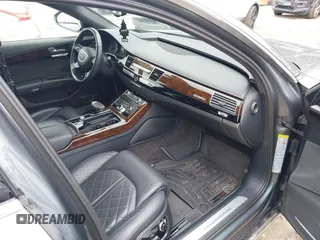 2015 Audi A8 3.0T z VIN WAU3GAFD5FN005065, wystawiony jako IAAI lot #41630450 z przebiegiem 122 939 mil mil oraz . Historia ofert i sprzedaży dostępna na DreamBid. Obrazek 5.