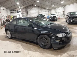 2010 Honda Civic Cpe LX with VIN 2HGFG1B69AH531712, listed as a IAAI auction lot 41235917 with 84,521 mi miles. Bid and sale history available at carsss.com. Image 1.