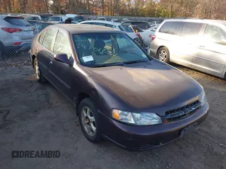 1999 Nissan Altima XE with VIN 1N4DL01D1XC193705, listed as a IAAI auction lot 40880059 with 183,605 mi miles. Bid and sale history available at carsss.com. Image 1.