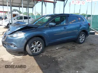2014 Mazda CX-9 Touring with VIN JM3TB3CV7E0440747, listed as a IAAI auction lot 42457709 with 166,588 mi miles and . Bid and sale history available at DreamBid. Image 2.