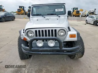 2004 Jeep Wrangler X z VIN 1J4FA39S34P702186, wystawiony jako Copart lot #59561675 z przebiegiem 202 214 mil mil oraz Szkoda całkowita • Salvage title. Historia ofert i sprzedaży dostępna na DreamBid. Obrazek 5.