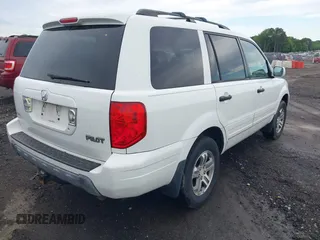 2003 Honda Pilot EX with VIN 2HKYF18453H566709, listed as a IAAI auction lot 42239595 with 191,626 mi miles and . Bid and sale history available at DreamBid. Image 4.