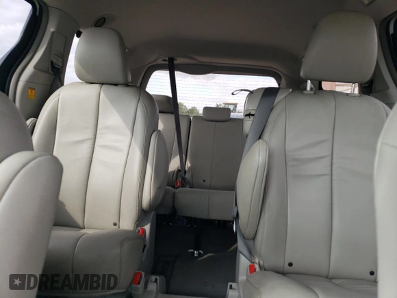 2012 Toyota Sienna XLE AAS with VIN 5TDYK3DC0CS250830, listed as a Copart auction lot 73323284 with 147,580 mi miles and Salvage Title. Bid and sale history available at DreamBid. Image 10.
