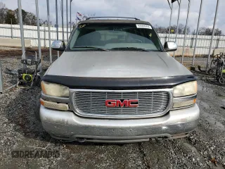 2001 GMC Yukon SLT z VIN 1GKEC13T51J145673, wystawiony jako Copart lot #83568954 z przebiegiem 310 415 mil mil oraz Szkoda całkowita • Salvage title. Historia ofert i sprzedaży dostępna na DreamBid. Obrazek 5.