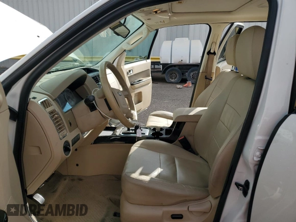 2010 Ford Escape Limited z VIN 1FMCU0EG8AKB93264, wystawiony jako Copart lot #48755805 z przebiegiem 69 141 mil mil oraz Szkoda całkowita • Salvage title. Historia ofert i sprzedaży dostępna na DreamBid. Obrazek 7.
