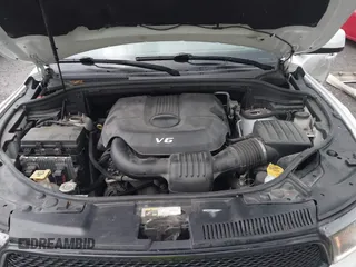 2014 Dodge Durango SXT with VIN 1C4RDJAG0EC561950, listed as a IAAI auction lot 42650331 with 106,959 mi miles and . Bid and sale history available at DreamBid. Image 10.