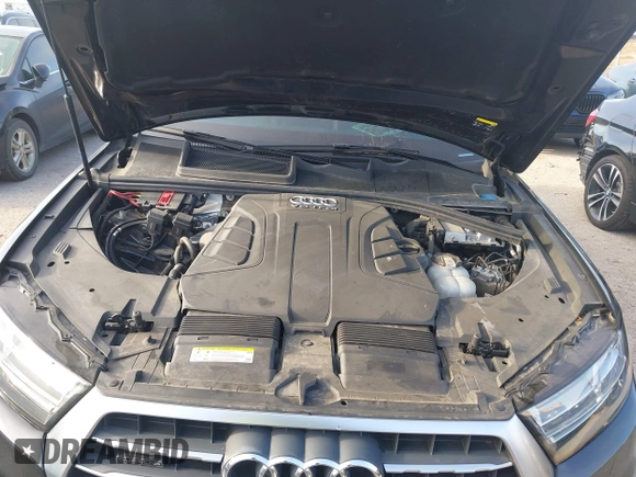 2018 Audi Q7 Premium Plus z VIN WA1LAAF75JD054810, wystawiony jako IAAI lot #42049892 z przebiegiem 43 297 mil mil oraz . Historia ofert i sprzedaży dostępna na DreamBid. Obrazek 10.