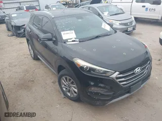 2017 Hyundai Tucson Value with VIN KM8J33A27HU388910, listed as a IAAI auction lot 41101112 with 107,138 mi miles. Bid and sale history available at carsss.com. Image 1.