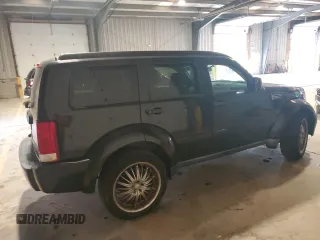2008 Dodge Nitro SXT z VIN 1D8GT28K28W246131, wystawiony jako Copart lot #60037665 z przebiegiem 119 831 mil mil oraz Szkoda całkowita • Salvage title. Historia ofert i sprzedaży dostępna na DreamBid. Obrazek 3.