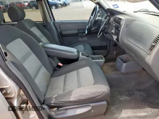 2005 Ford Explorer Sport Trac XLS with VIN 1FMZU67K95UA94980, listed as a Copart auction lot 63490315 with 126,737 mi miles and Salvage title. Bid and sale history available at DreamBid. Image 7.