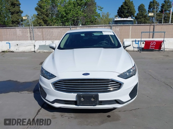 2019 Ford Fusion Hybrid SE with VIN 3FA6P0LU9KR207824, listed as a IAAI auction lot 42153330 with 69,966 mi miles. Bid and sale history available at carsss.com. Image 12.