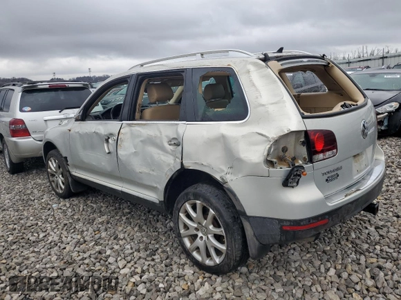 2010 Volkswagen Touareg VR6 with VIN WVGBF7A9XAD002471, listed as a Copart auction lot 83592274 with 202,497 mi miles and Salvage Title. Bid and sale history available at DreamBid. Image 2.
