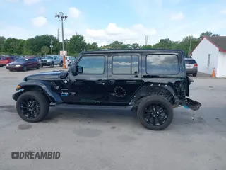 2022 Jeep Wrangler Unlimited Sahara with VIN 1C4JJXP60NW153776, listed as a IAAI auction lot 42108916 with 39,123 mi miles and . Bid and sale history available at DreamBid. Image 15.