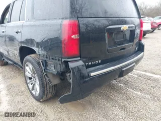 2016 Chevrolet Tahoe LTZ with VIN 1GNSKCKC2GR104305, listed as a IAAI auction lot 41697868 with 124,670 mi miles. Bid and sale history available at carsss.com. Image 18.