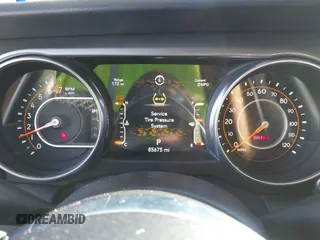 2018 Jeep Wrangler Unlimited Sahara with VIN 1C4HJXEG8JW239535, listed as a IAAI auction lot 41711596 with 85,675 mi miles. Bid and sale history available at carsss.com. Image 7.