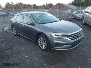 2020 Volkswagen Passat 2.0T SE with VIN 1VWWA7A36LC003025, listed as a IAAI auction lot 41186381 with 112,833 mi miles. Bid and sale history available at carsss.com. Image 1.