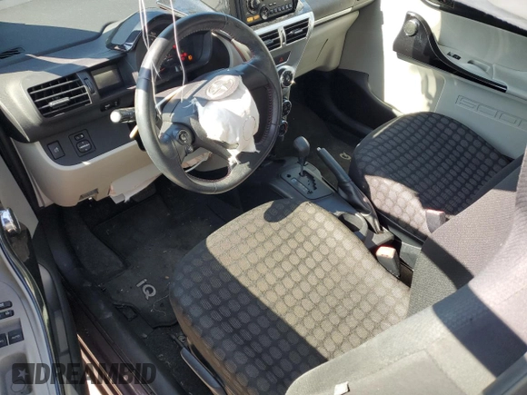 2012 Scion iQ z VIN JTNJJXB02CJ015858, wystawiony jako Copart lot #55963055 z przebiegiem 37 122 mil mil oraz Nie do naprawy • Non repairable. Historia ofert i sprzedaży dostępna na DreamBid. Obrazek 8.