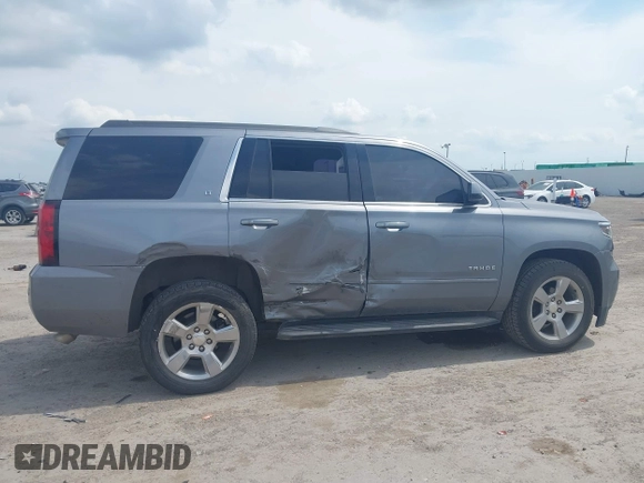 2019 Chevrolet Tahoe LT z VIN 1GNSCBKC8KR406519, wystawiony jako IAAI lot #42145021 z przebiegiem 74 694 mil mil oraz . Historia ofert i sprzedaży dostępna na DreamBid. Obrazek 6.