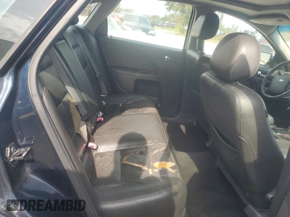2009 Ford Taurus Limited with VIN 1FAHP25W59G124413, listed as a Copart auction lot 77771044 with 228,831 mi miles and Salvage Title. Bid and sale history available at carsss.com. Image 10.