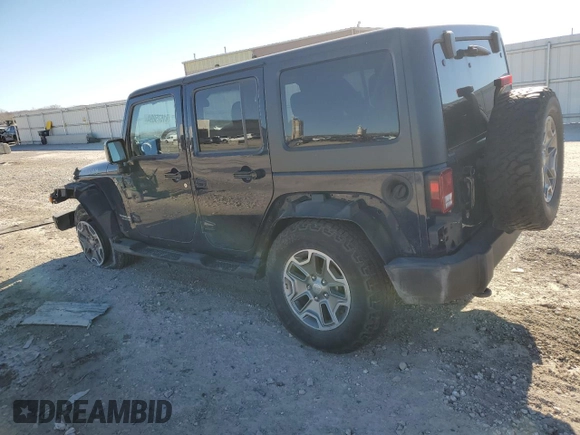 2013 Jeep Wrangler Unlimited Rubicon 10th Anniversary с VIN 1C4HJWFG7DL559539, выставлен на аукционе Copart как лот 81675894 с пробегом 99 425 миль миль и Списание • Salvage title. История ставок и продаж доступна на DreamBid. Изображение 2.