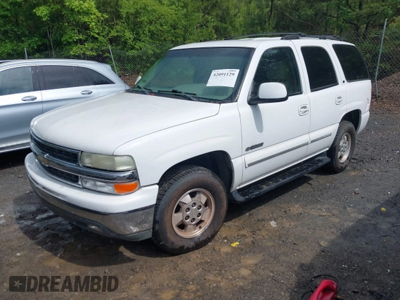 2003 Chevrolet Tahoe LT with VIN 1GNEC13Z03J150595, listed as a IAAI auction lot 42091129 with 247,732 mi miles. Bid and sale history available at carsss.com. Image 2.