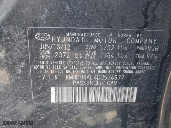 2013 Hyundai Elantra GLS PZEV with VIN KMHDH4AE4DU574977, listed as a IAAI auction lot 41608098 with 116,899 mi miles. Bid and sale history available at carsss.com. Image 9.